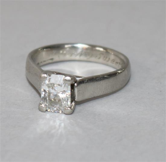 A modern platinum and radiant cut solitaire diamond ring, of good colour and clarity, the stone weighing approximately 1.80cts